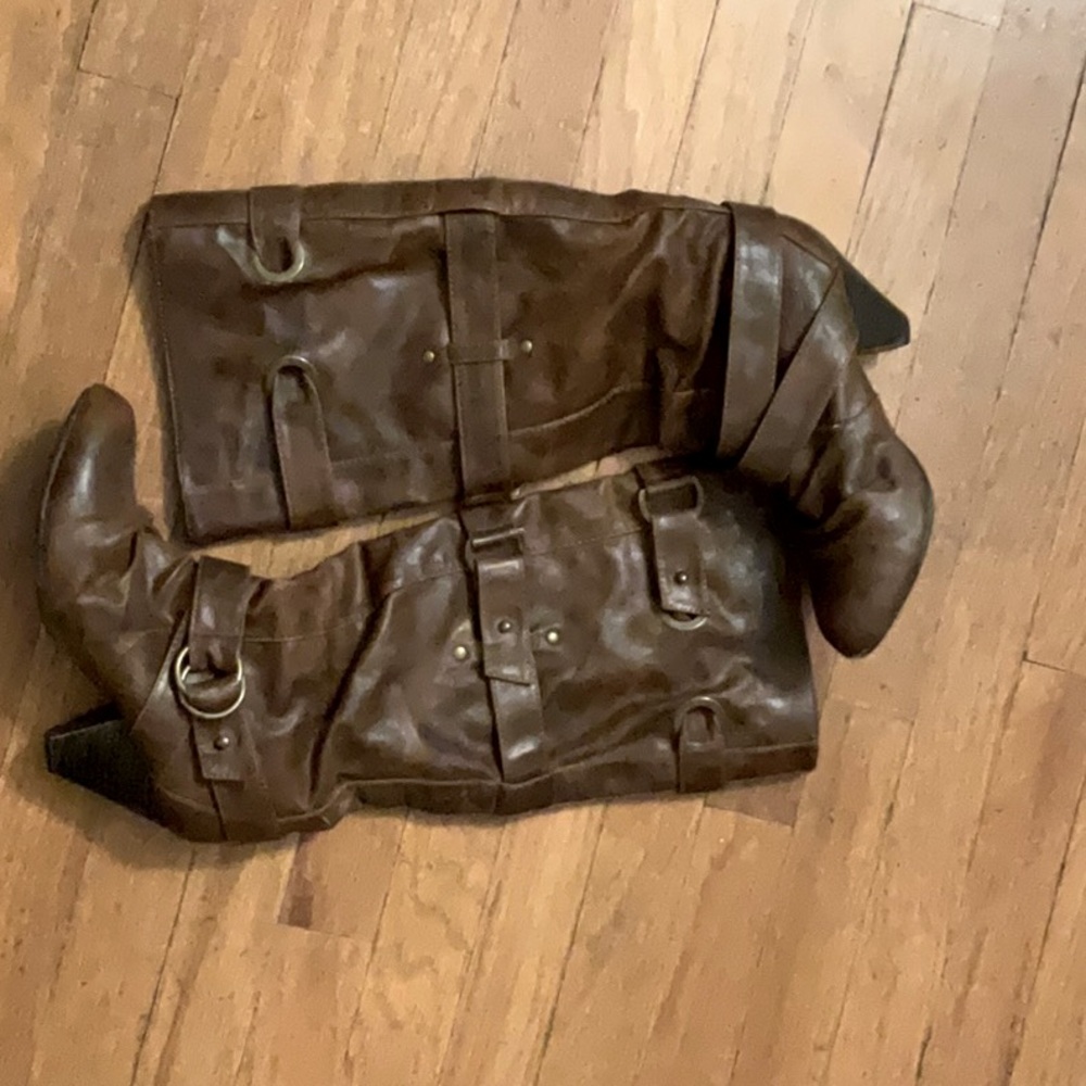 These boots are a size six and are brown leather with a soft soul.